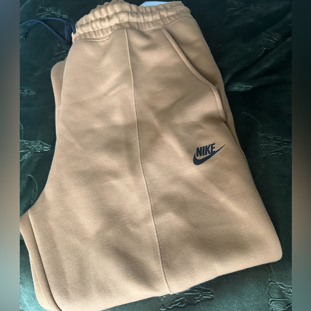 Nike women’s camel colored Joggers size large